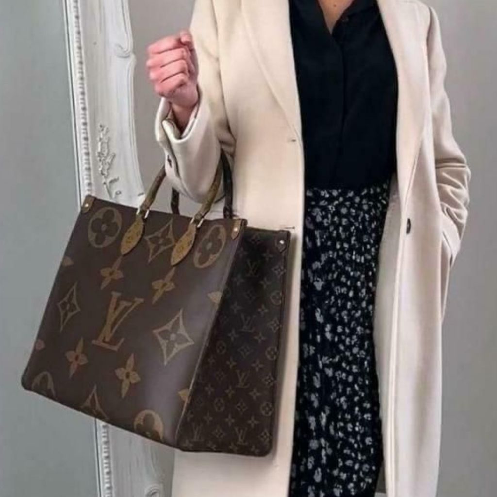 Shop Louis Vuitton NEVERFULL Women's Black Bags